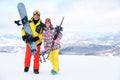 Lovely couple with equipment at resort. Winter vacation Royalty Free Stock Photo