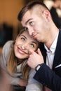 Lovely couple fooling around at a cafe. Funny face expressions