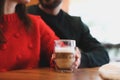 Lovely couple with fresh morning coffee in cafe, closeup Royalty Free Stock Photo