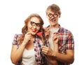 Lovely couple holding party glasses