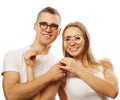 Lovely couple holding party glasses