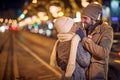 Lovely couple sharing happy moments; Winter joy concept