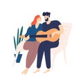Lovely couple sitting on bench and playing guitar. Pair of young adorable man and woman cuddling and singing songs on
