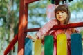 Portrait of a Cute Adorable Girl at the Playground Having Fun Royalty Free Stock Photo