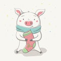 Lovely cute cheerful piggy sits in scarf with Christmas sock