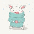 Lovely cute cheerful piggy sits in sweater or jersey with cup and heart