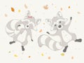 Lovely cute raccoons lie on the ground in leaves. Autumn cartoon animal.