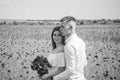 Lovely date. happy man and woman in love enjoy spring weather. happy relations. girl and guy in field. bride and groom Royalty Free Stock Photo