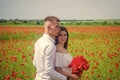 Lovely date. happy man and woman in love enjoy spring weather. happy relations. girl and guy in field. bride and groom Royalty Free Stock Photo