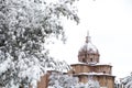 A lovely day of snow in Rome, Italy, 26th February 2018: a beautiful view of snowy Roman Forums and Church of the Saints Luca and Royalty Free Stock Photo