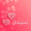 Lovely decorative hearts on pink bokeh background