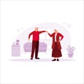 The lovely elderly couple, dancing and having fun in a room filled with chairs, tables, and flowers. Royalty Free Stock Photo