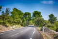 Lovely, empty country road lined with sycamore trees in Provence, southern France Royalty Free Stock Photo