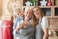 Lovely female family portrait over kitchen background Royalty Free Stock Photo