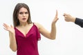 Negative human emotions and feelings. Lovely female frowning to the zilch sign her man shows her saying that she is Royalty Free Stock Photo