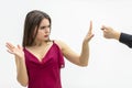 Negative human emotions and feelings. Lovely female frowning to the zilch sign her man shows her saying that she is Royalty Free Stock Photo