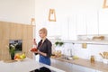 Lovely female posing and smiling at camera with plate of ripe st Royalty Free Stock Photo