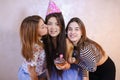 Lovely friendly girls celebrate birthday of their female friends Royalty Free Stock Photo