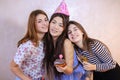 Lovely friendly girls celebrate birthday of their female friends Royalty Free Stock Photo