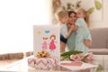 Lovely gifts from cute little children for their mother on table