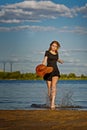 Lovely girl coming out of the water. Royalty Free Stock Photo