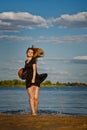 Lovely girl coming out of the water. Splash. Royalty Free Stock Photo