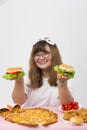 A lovely girl feel interest and happy with fastfood