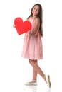 Lovely Girl Holding A Red Heart Shape, Over White Background
