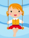 The lovely girl shakes on a swing