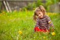 Lovely girl sitting in grass. Royalty Free Stock Photo