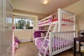 Lovely girls bedroom with bunk bed and carpet floor.