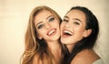 Lovely girls are smiling. Two young girlfriends having fun Royalty Free Stock Photo