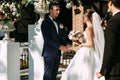 Lovely glance of the groom on his bride