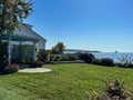 Lovely green grassy lawn with water view on Mackinac Island in Michigan