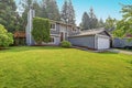 Lovely grey rambler house exterior features grey siding Royalty Free Stock Photo