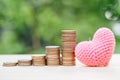 lovely heart with money coin stack for love to saving or keeping money business profit