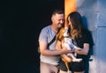 Lovely hipster couple with their adorable King Charles spaniel puppy