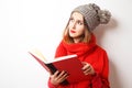 Lovely Hipster Girl in Winter Clothes with Book Royalty Free Stock Photo