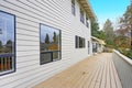 Lovely home features a wraparound deck Royalty Free Stock Photo