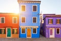 Lovely house facade and colorful walls in Burano, Venice. Burano island canal, colorful houses and boats, Venice landmark, Italy. Royalty Free Stock Photo