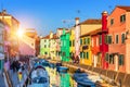 Lovely house facade and colorful walls in Burano, Venice. Burano island canal, colorful houses and boats, Venice landmark, Italy. Royalty Free Stock Photo