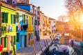 Lovely house facade and colorful walls in Burano, Venice. Burano island canal, colorful houses and boats, Venice landmark, Italy. Royalty Free Stock Photo