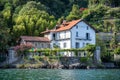 Lovely house with patio and green plants on lake maggiore in cannero riviera resort