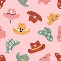 Lovely illustrated cowboy hats with different ornaments, cactus, horseshoe, stars. Vector hand drawn illustration, seamless