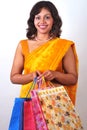 Lovely Indian woman with shopping bags