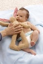 Lovely infant with plush bunny Royalty Free Stock Photo