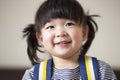 Lovely and innocent asian kid smiled happily Royalty Free Stock Photo