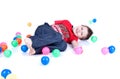 A lovely kid is playing with balls Royalty Free Stock Photo