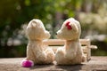 Lovely kiss teddy bear on wood and wooden box Concept of love an