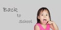 Lovely Little Asian child thinking. Back to school concept Royalty Free Stock Photo